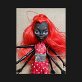 Creepy Eight-Legged Doll with Fiery Red Hair