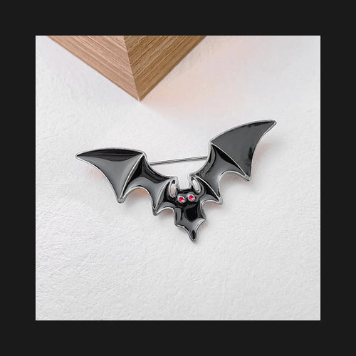 Creepy Bat Enamel Pin with Sinister Red Eyes